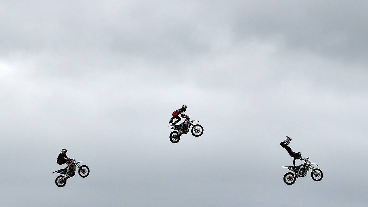 Bolddog Lings freestyle motocross stunt performers put on a display at the annual Balmoral agricultural show, which has returned after being cancelled last year due to coronavirus disease (COVID-19), in Lisburn, Northern Ireland, September 23. (Image: Reuters)