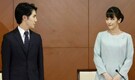 Japan's Princess Mako marries classmate from college, loses royal status