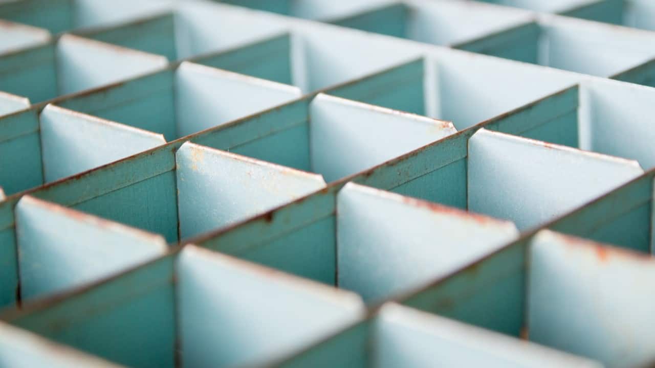 Storage bins, acrylic boxes, and collapsible drawer systems are inexpensive and easily available.