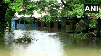 Water from overflowing Pampa river enters nearby houses following heavy rainfall in the area in Pathanamthitta, Kerala. (Image: ANI)