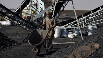 Coal India shares edge higher after board approves payment of interim dividend
