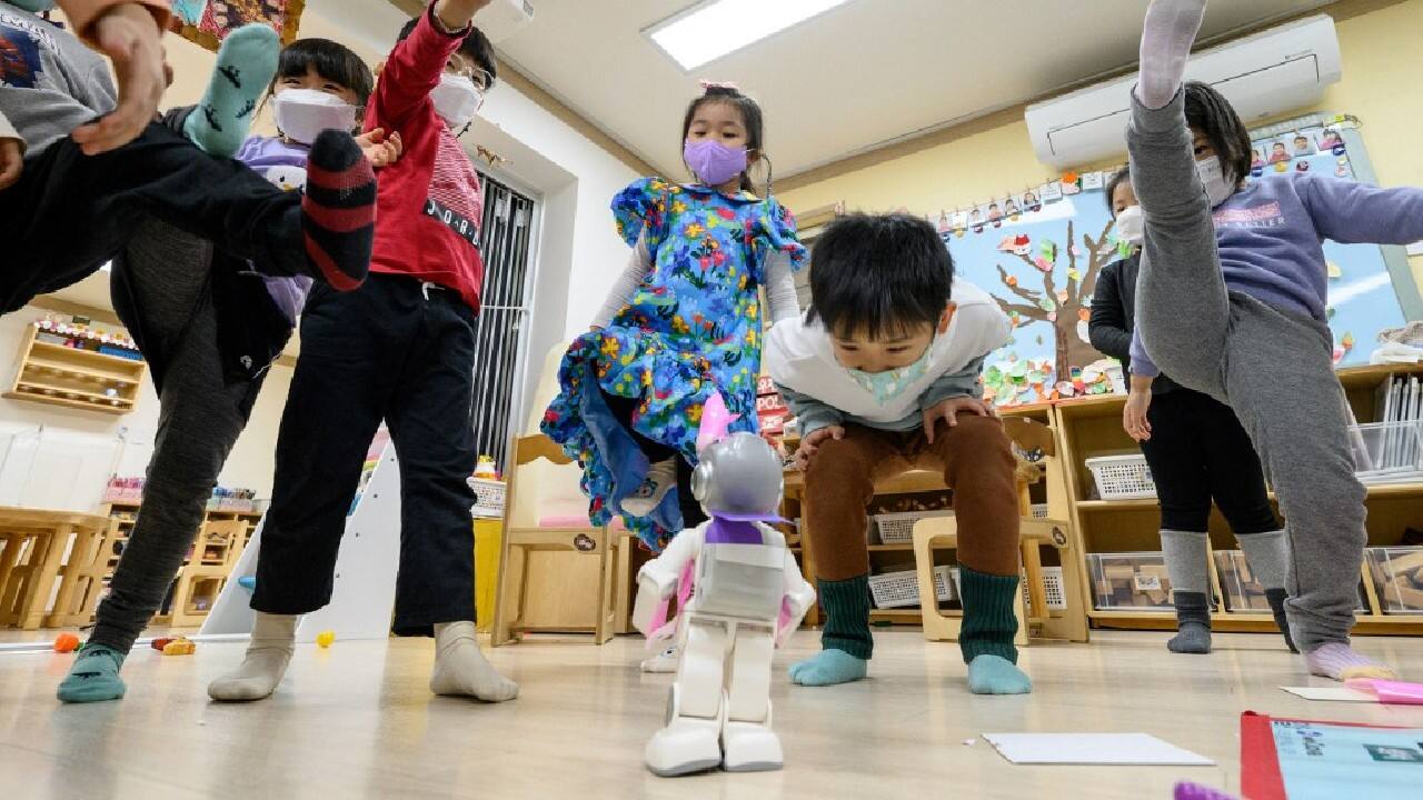 The "Alpha Mini" is just 24.5 centimetres tall and can dance, lead sing-a-longs, recite stories and even teach kung-fu moves as children mimic its push-ups and one-legged balances. (Image: AFP) The "Alpha Mini" is just 24.5 centimetres tall and can dance, lead sing-a-longs, recite stories and even teach kung-fu moves as children mimic its push-ups and one-legged balances. (Image: AFP)