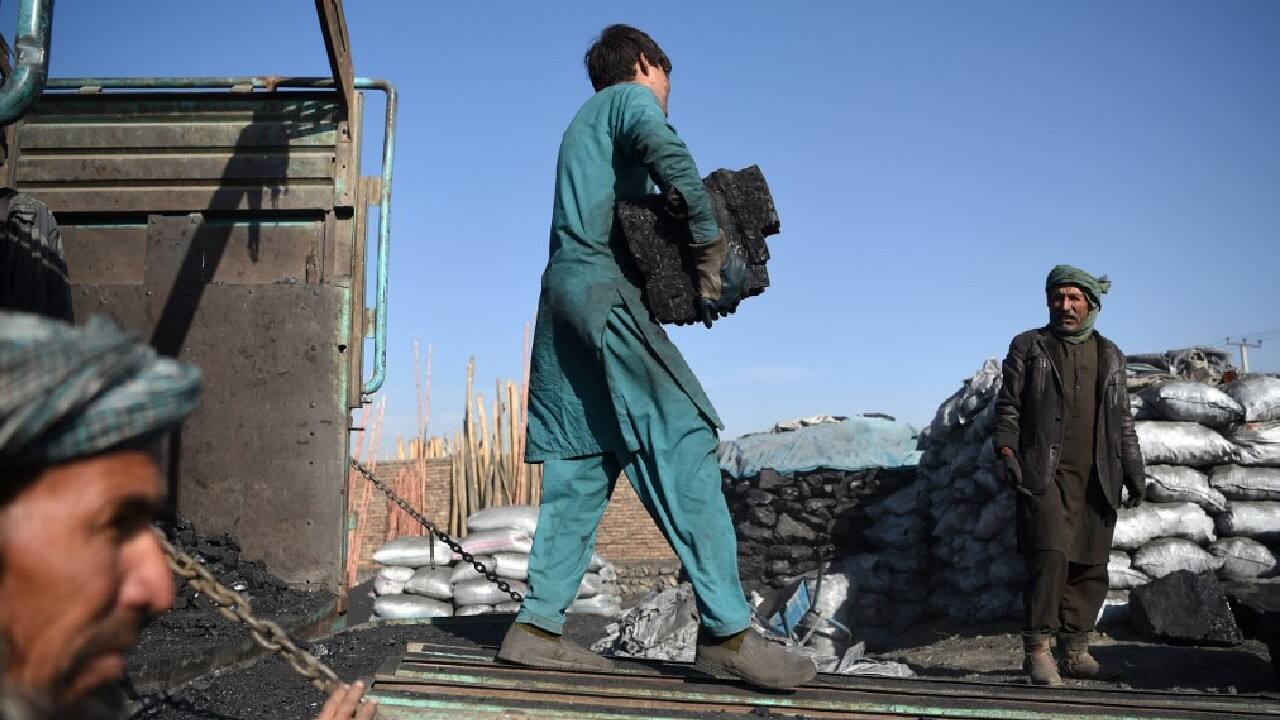 "If we had electricity and gas, people wouldn't use coal," says one of the market traders, Abdullah Rahimi. None of Rahimi's 40 or so employees seems to have escaped the black dust that has crept deep into the wrinkles of the older workers. (Image: AFP) "If we had electricity and gas, people wouldn't use coal," says one of the market traders, Abdullah Rahimi. None of Rahimi's 40 or so employees seems to have escaped the black dust that has crept deep into the wrinkles of the older workers. (Image: AFP)