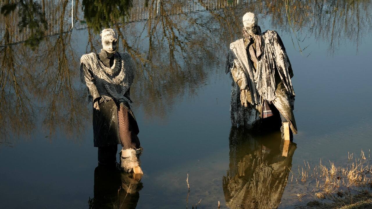 Zombie figures are seen in a pond during Halloween festival in Kirkilai amusement park near Birzai, Lithuania October 30. (Image: Reuters)
