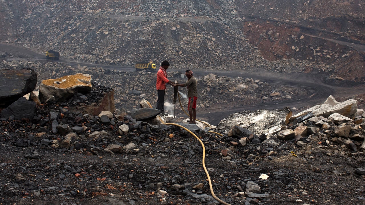 Workers drill at an open cast coal field at Dhanbad district in Jharkhand. (PC-Reuters)