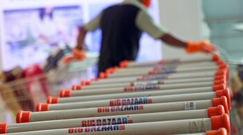 Shopping carts are seen outside the Big Bazaar retail store in Mumbai. REUTERS/Niharika Kulkarni.