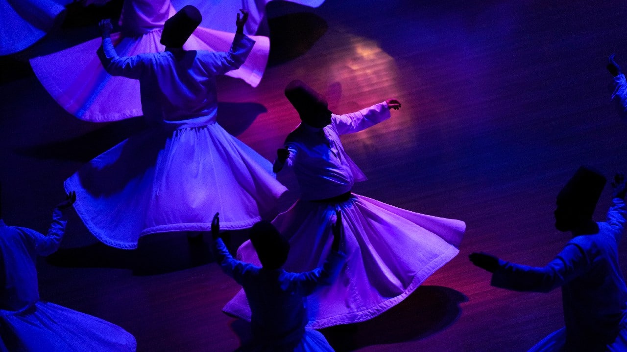 Leaving their cloaks on the ground, they take their places around the circular floor and begin to spin to reach a trance-like state that they believe unites them with God. The ritual is performed to the sound of chanting and music from a reed flute and other instruments. (Image: AP)