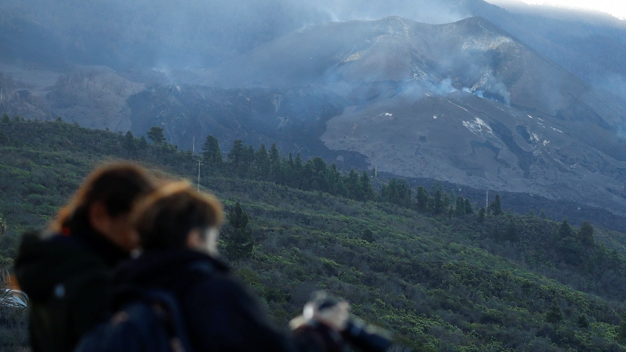 The Cumbre Vieja volcano on the Spanish island of La Palma was silent for a second day on December 15, giving scientists the first chance to study the main crater from its brink as the eruption appeared to be nearing its end after three months. (Image: Reuters) The Cumbre Vieja volcano on the Spanish island of La Palma was silent for a second day on December 15, giving scientists the first chance to study the main crater from its brink as the eruption appeared to be nearing its end after three months. (Image: Reuters)