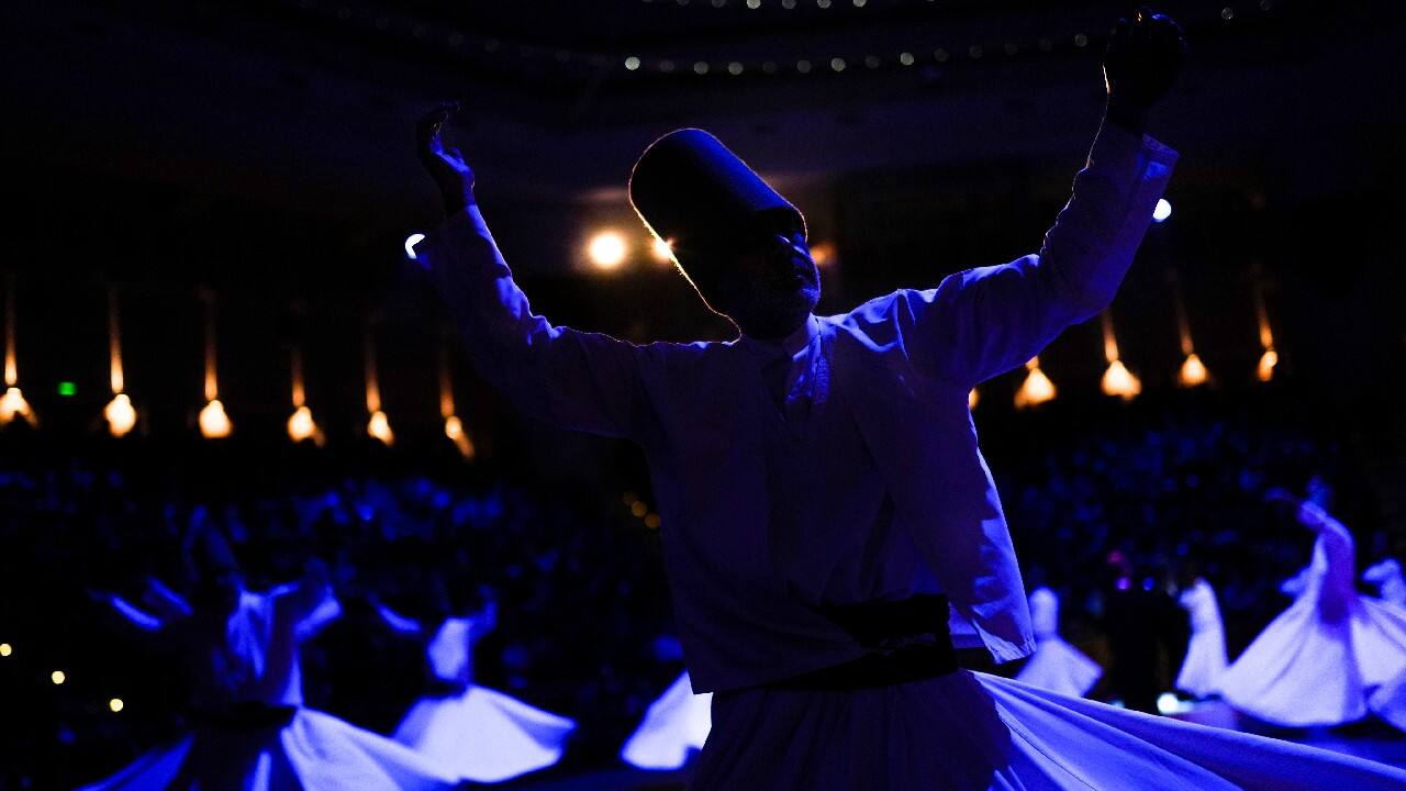 As they whirl, the dervishes' right hands are symbolically turned upward toward God, while their left hands are turned downward to Earth. The ceremony ends as it started, with the recital of prayers. (Image: AP)