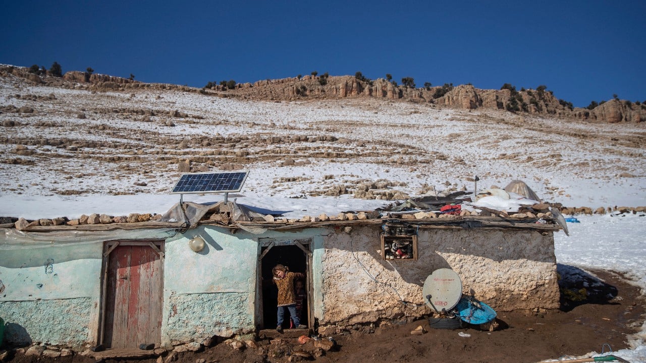 The mountains, known for their red-shaded soil, give way to what seems like an endless white. The isolation remains until the road leading to the village is reopened by local authorities’ tractors. But they are often delayed. (Image: AP)