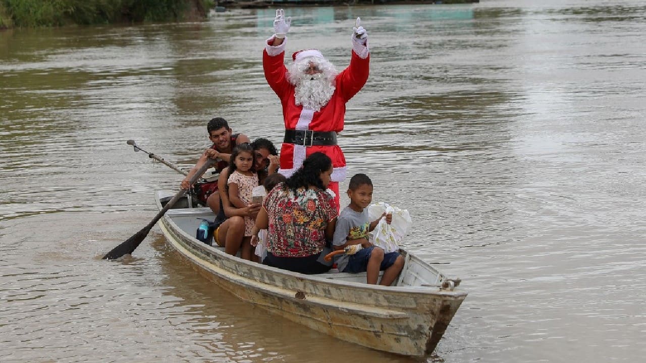&quot;You can't change the world, but you can make children smile at Christmastime,&quot; Santa tells AFP. (Don't tell the children, but his real name is Jorge Alberto, he is 57 years old and his beard, sad to say, is fake.) (Image: AFP)