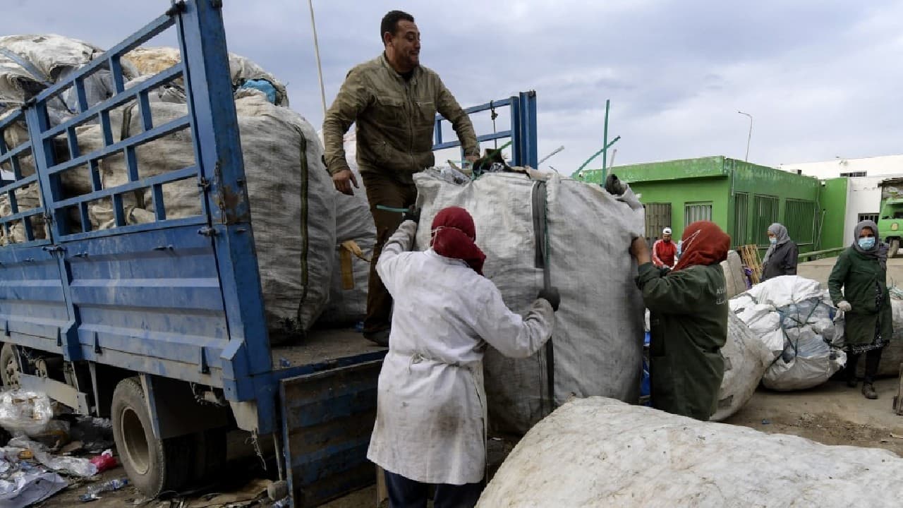 Every day, a steady stream of minivans and small trucks bring to his facility in Mghira, near Tunis, bales of plastic waste to be weighed, sorted and cut into fine chips for industrial use. Much is collected by hand from the streets and bins of the capital by "barbechas", informal waste pickers. (Image: AFP)