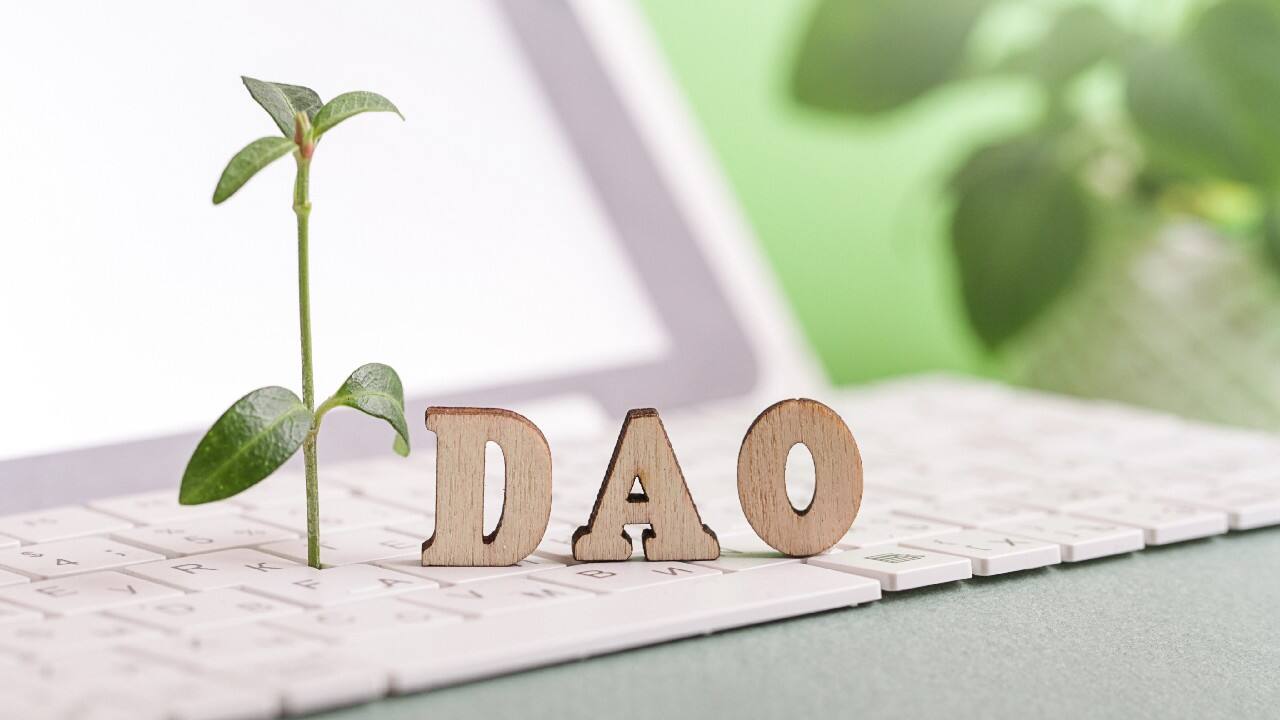 DAO | A decentralized autonomous organization (DAO) is generally an internet community owned by its members and run on blockchain technology. DAOs use smart contracts, pieces of code that establish the group's rules and automatically execute decisions. In recent months, crowd-funded crypto-group ConstitutionDAO tried and failed to buy a rare copy of the U.S. Constitution in an auction held by Sotheby's. (Image: Shutterstock) DAO | A decentralized autonomous organization (DAO) is generally an internet community owned by its members and run on blockchain technology. DAOs use smart contracts, pieces of code that establish the group's rules and automatically execute decisions. In recent months, crowd-funded crypto-group ConstitutionDAO tried and failed to buy a rare copy of the U.S. Constitution in an auction held by Sotheby's. (Image: Shutterstock)
