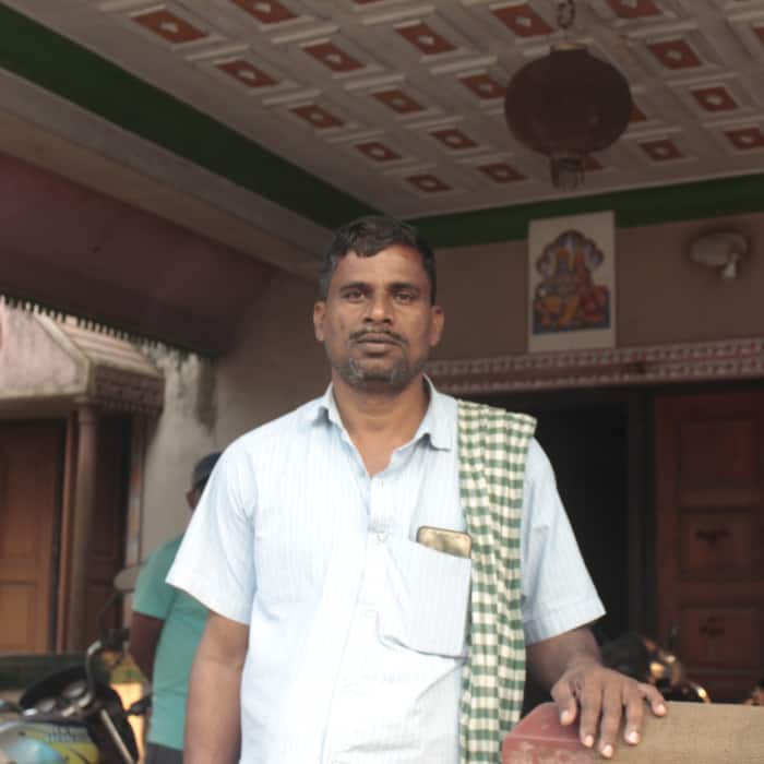 Debendra Swain from Jindal Pratirodh Sangram Samiti in front of his house