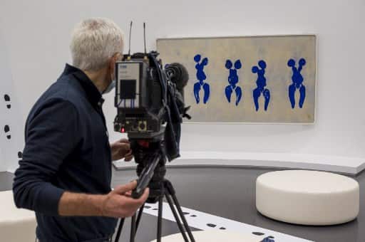 A media films "Anthropometrie de l'Epoque Bleue" (1960) by French artist Yves Klein during the exhibition "Le ciel comme atelier. Yves Klein et ses contemporains" at the Pompidou-Metz museum in Metz, eastern France on July 16, 2020. 