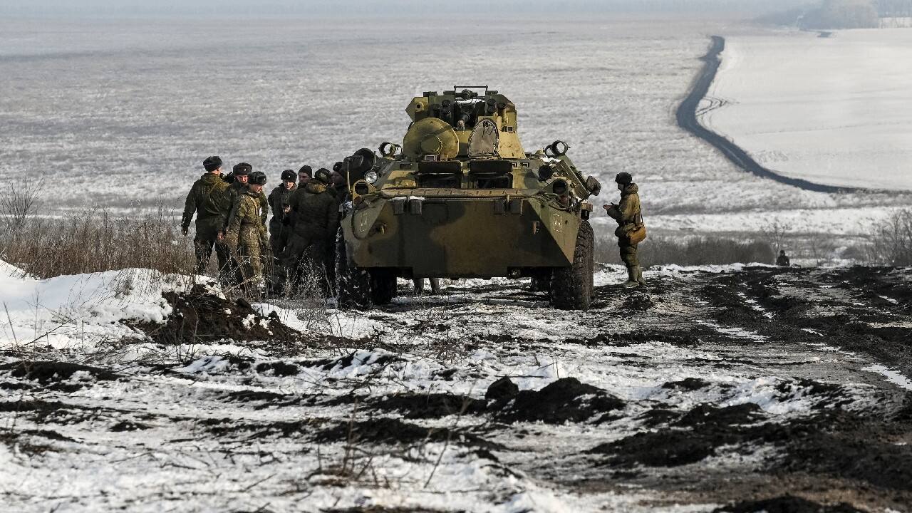 Russian army service members are seen next to an armoured personnel carrier BTR-82 during drills at the Kuzminsky range in the southern Rostov region, Russia January 26. (Image: Reuters)