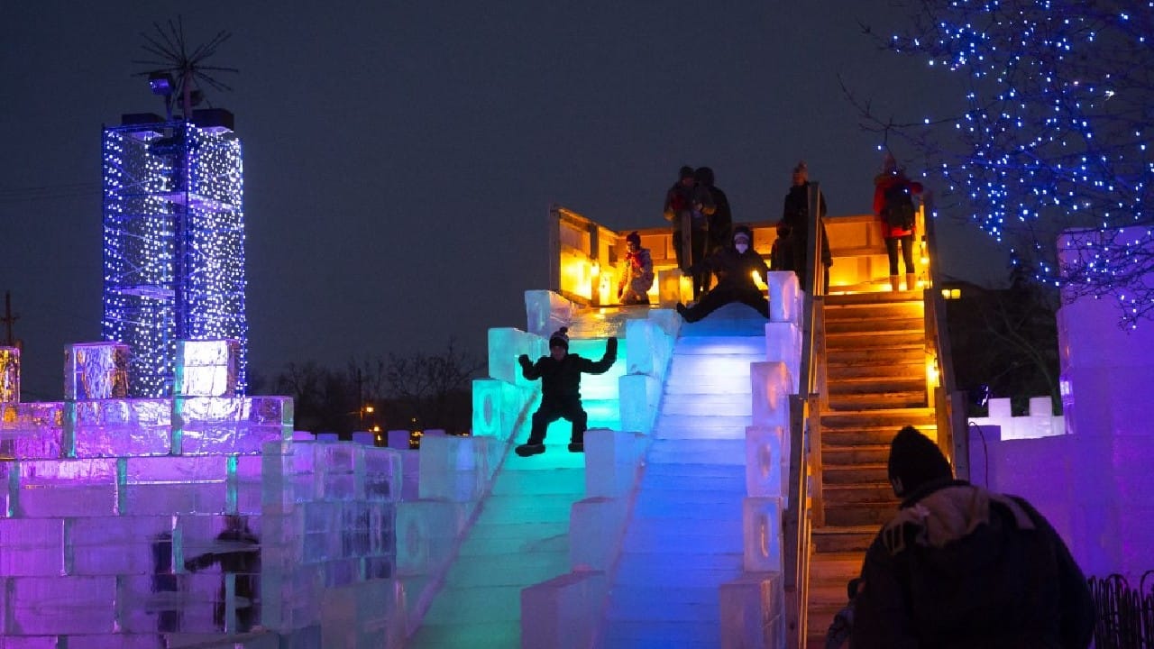 Children enjoy the slide next to the Ice Palace Maze in Stillwater, Minnesota on January 21. (Image: AFP)