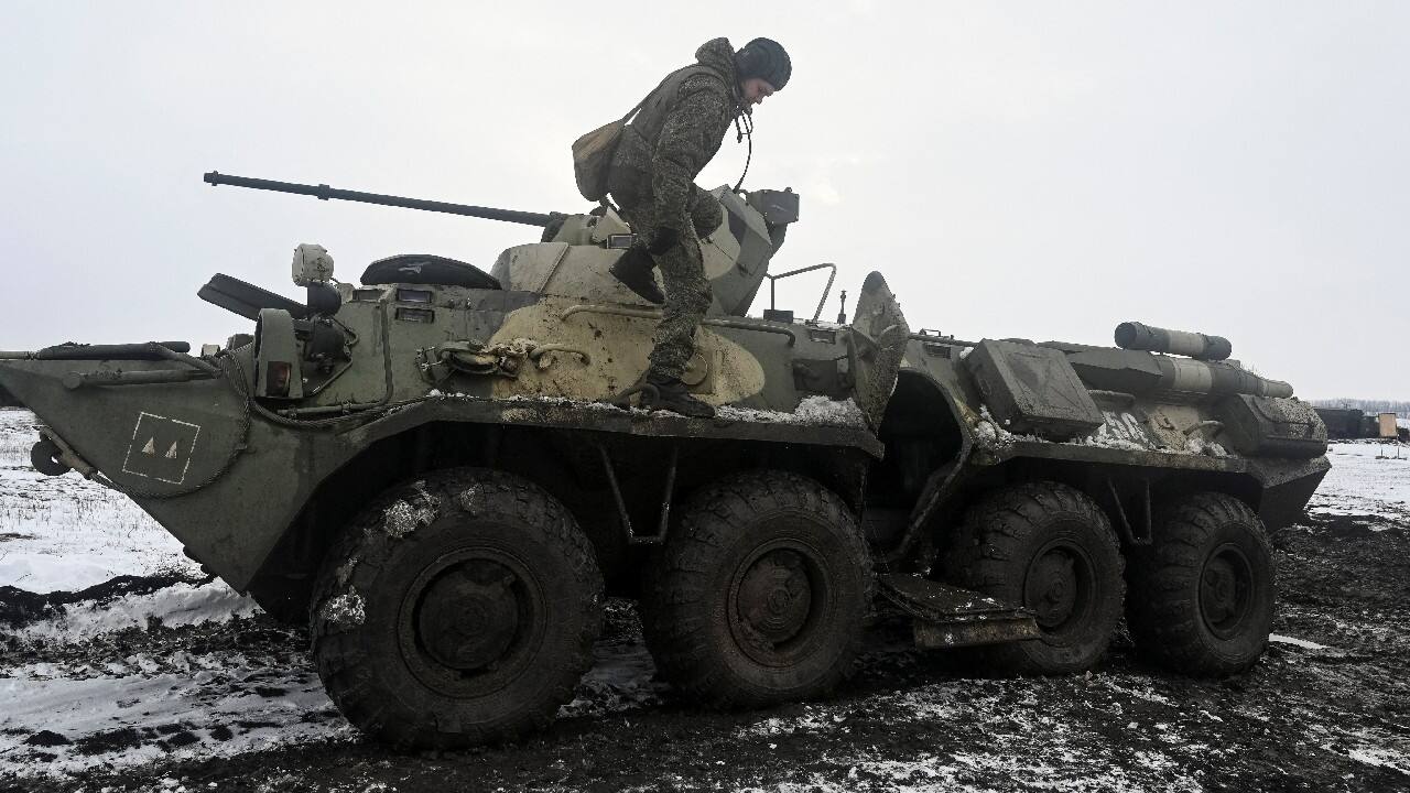 A Russian army service member gets off an armoured personnel carrier BTR-82 during drills at the Kuzminsky range in the southern Rostov region, Russia January 26. (Image: Reuters)