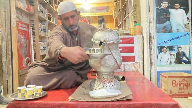 Traditionally, kahwa is prepared in a copper kettle known as samavar. A samavar has a central cavity in which live coals are placed to keep the tea hot. Around this cavity, there is a space for water to boil and the tea leaves and other ingredients are mixed with the water. The Saffron Kahwa served along the Srinagar-Jammu national highway near Pampore is famous, and tourists flock here for a sip of tradition. (Photo by Irfan Amin Malik)