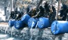 Afghan agents pour 3,000 litres of liquor into Kabul canal