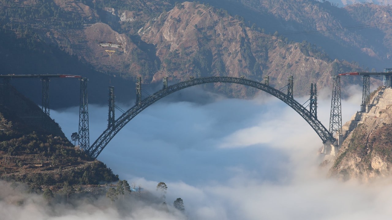 Indian railways is constructing world’s highest railway bridge over River Chenab in Jammu and Kashmir’s Reasi district. Standing above the clouds, the iconic arch bridge is 1.3 km long. (Image: Twitter @RailMinIndia)