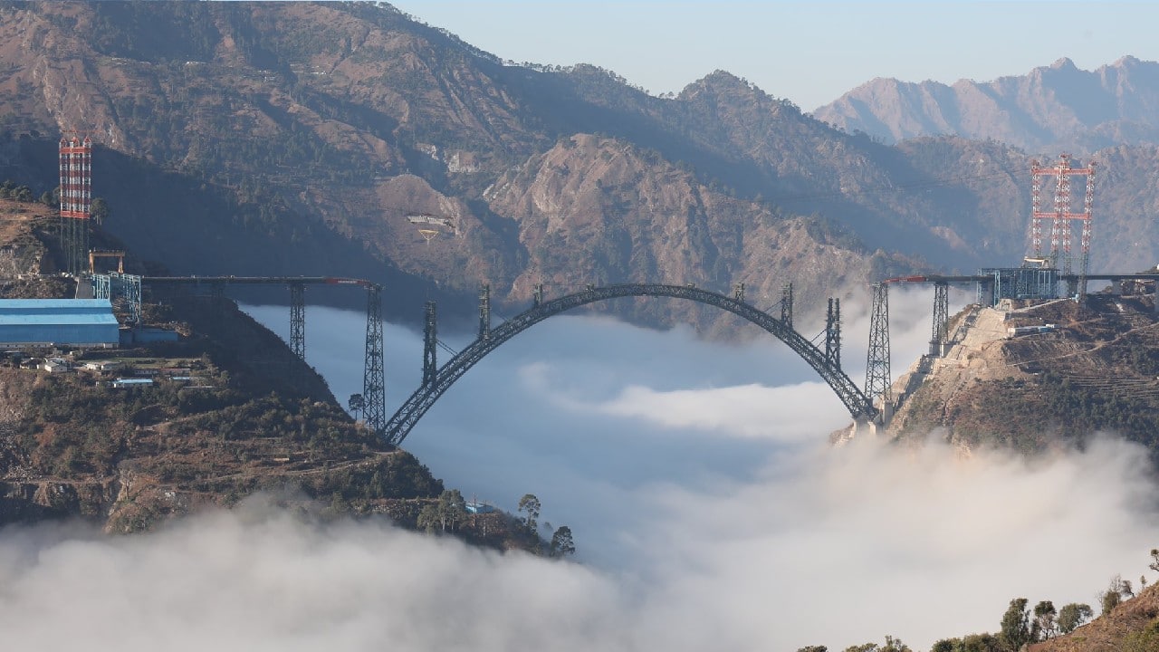 The project directed by Northern Railways, was declared a national project in 2002. The iconic railway arch bridge over the river Chenab will connect the Kashmir valley to the rest of the nation. (Image: Twitter @RailMinIndia)