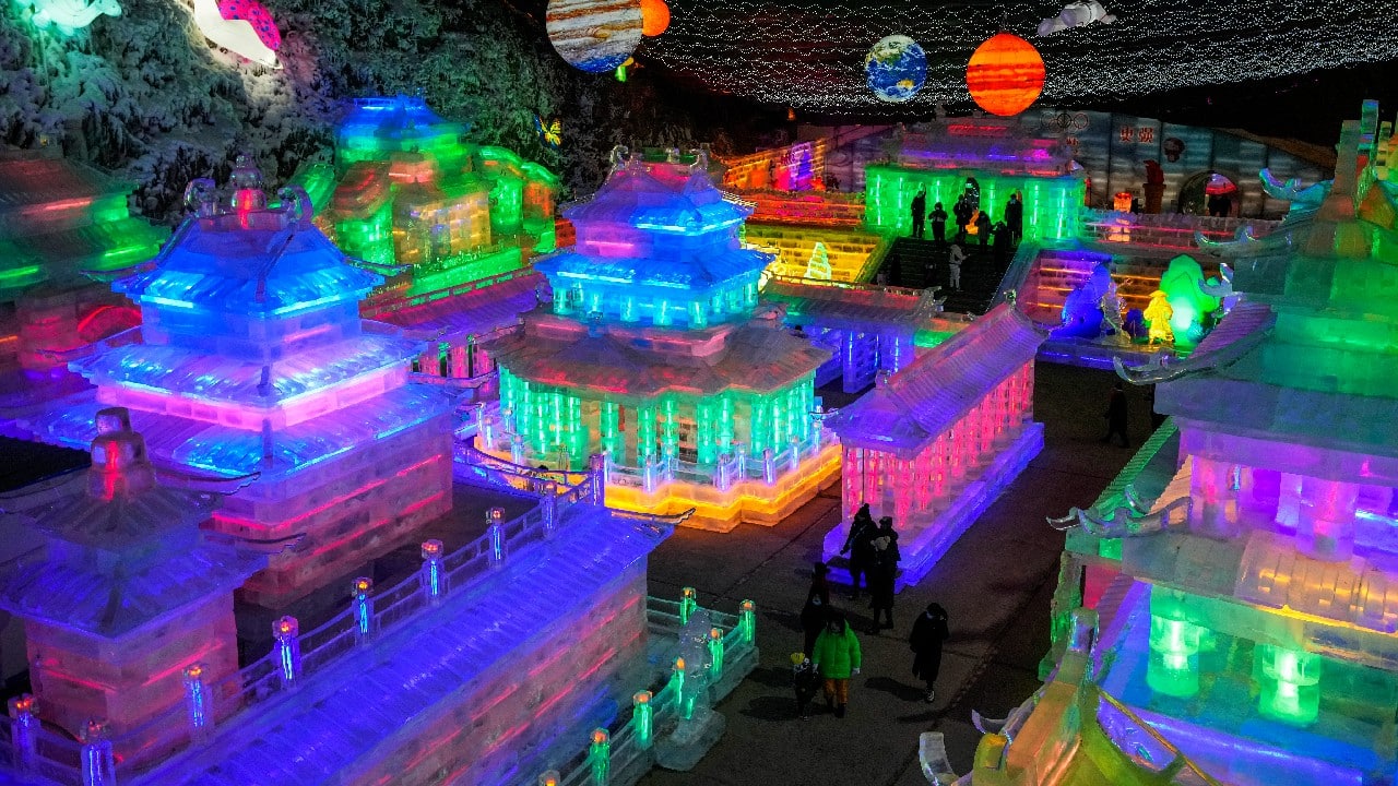 Residents tour the ice sculptures lit by colorful lights at the Longqingxia Ice and Snow Festival, during the Lantern Festival in Yanqing district of Beijing, February 15. Tuesday marks the Lantern Festival in China, the final day of the annual celebration of the Chinese Lunar New Year. (Image: AP)