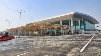 Outside the new arrival terminal, the pickup lanes have been realigned and expanded to reduce traffic congestion.
