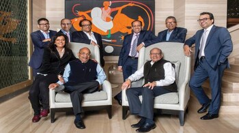 The Emami family: Manish Goenka, Prashant Goenka, Aditya V Agarwal, Mohan Goenka, Sushil Goenka and Harsh Agarwal (standing left to right); Priti A Sureka, R S Agarwal, R S Goenka (sitting left to right).