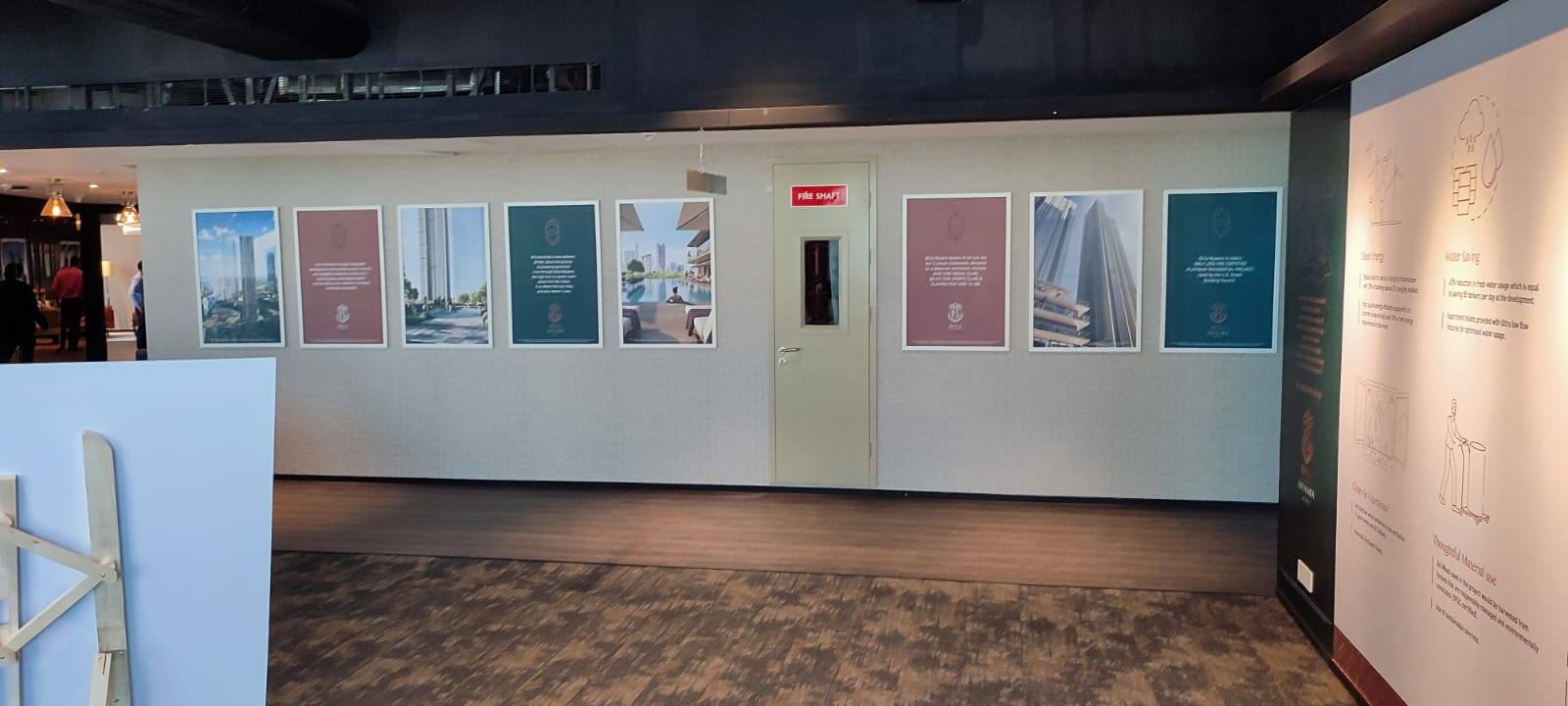 Despite the marketing blitzkreig, a prospective buyer is shown the photos of the project in the lobby since there is no sample flat to see.