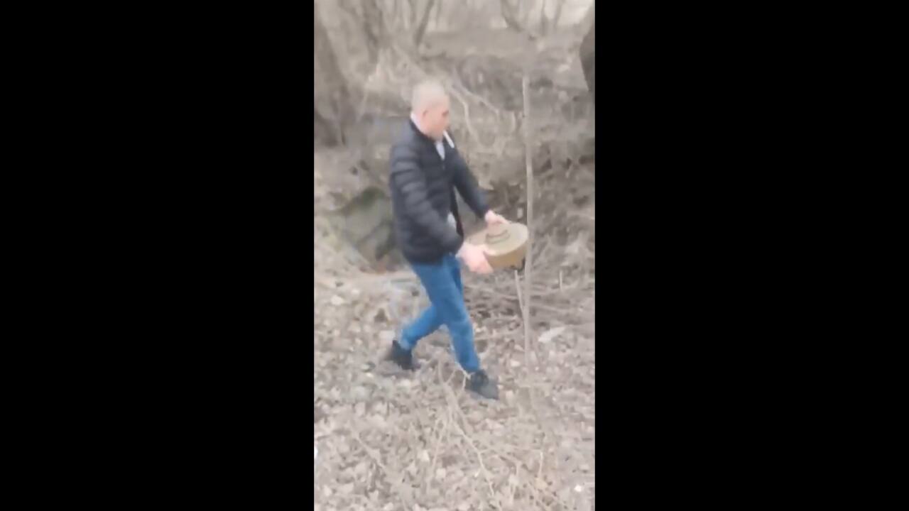In daring video, Ukrainian man carries landmine with bare hands amid Russian invasion