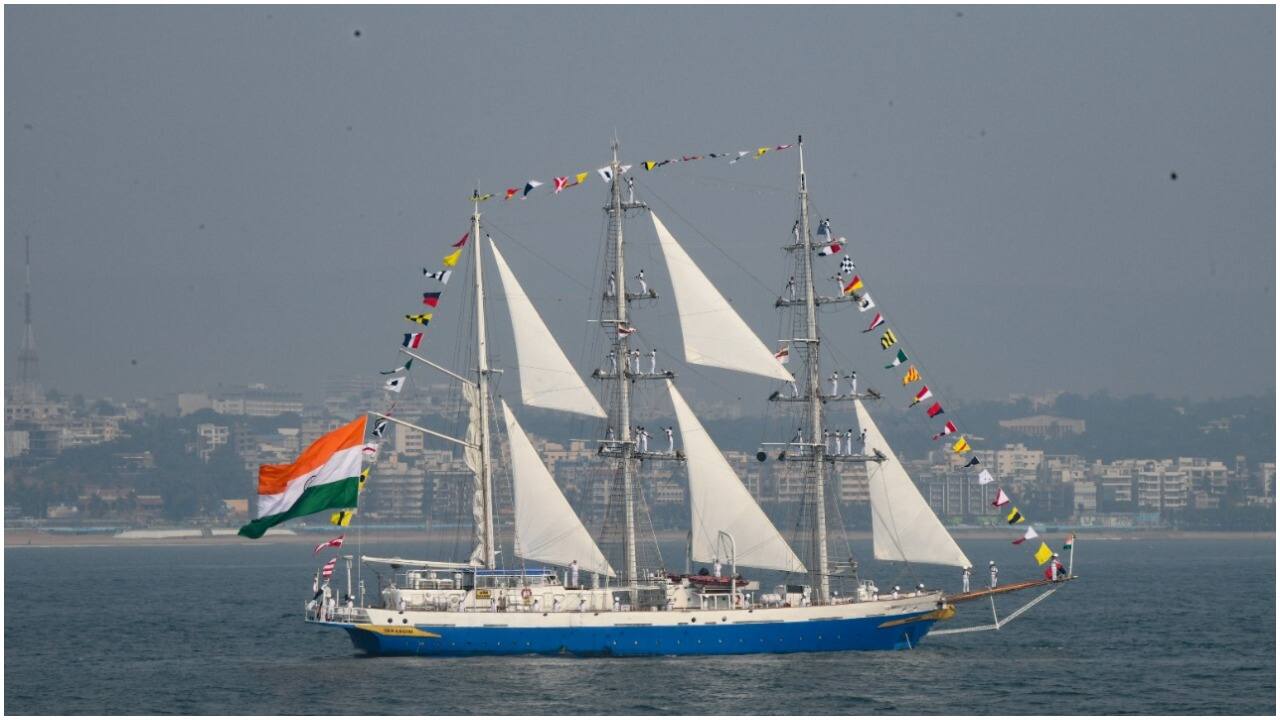 A ship decorated ceremoniously with various naval flags in full regalia. (Image credit: @indiannavy/Twitter)