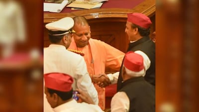 In Pics | Yogi Adityanath, Akhilesh Yadav share a rare moment of bonhomie in UP Assembly