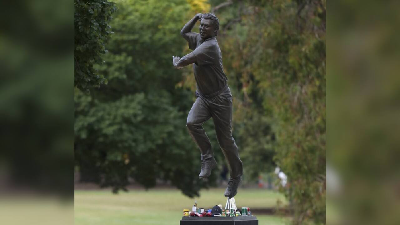 A statue of Warne outside the cricket ground became a focus of public grief. Tributes left at the statue included beer bottles and cigarette packets. It was a nod to how Warne once described himself in words repeated at his service by his father, Keith Warne: “I smoked, I drank and I played a little cricket.” (Image: AP) A statue of Warne outside the cricket ground became a focus of public grief. Tributes left at the statue included beer bottles and cigarette packets. It was a nod to how Warne once described himself in words repeated at his service by his father, Keith Warne: “I smoked, I drank and I played a little cricket.” (Image: AP)