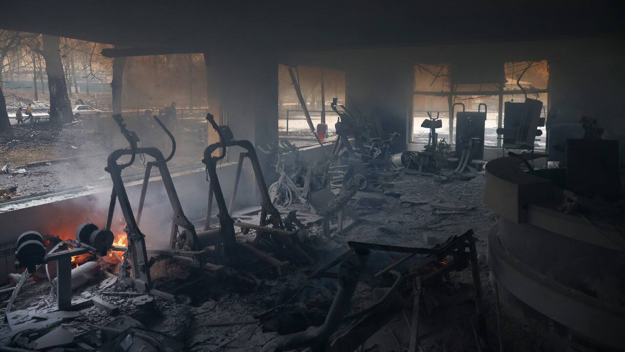 Smoke rises from a burnt fitness center ruined after yesterday's blast targeted the TV tower as Russia's invasion of Ukraine continues, in Kyiv, Ukraine March 2. (Image: Reuters) Smoke rises from a burnt fitness center ruined after yesterday's blast targeted the TV tower as Russia's invasion of Ukraine continues, in Kyiv, Ukraine March 2. (Image: Reuters)