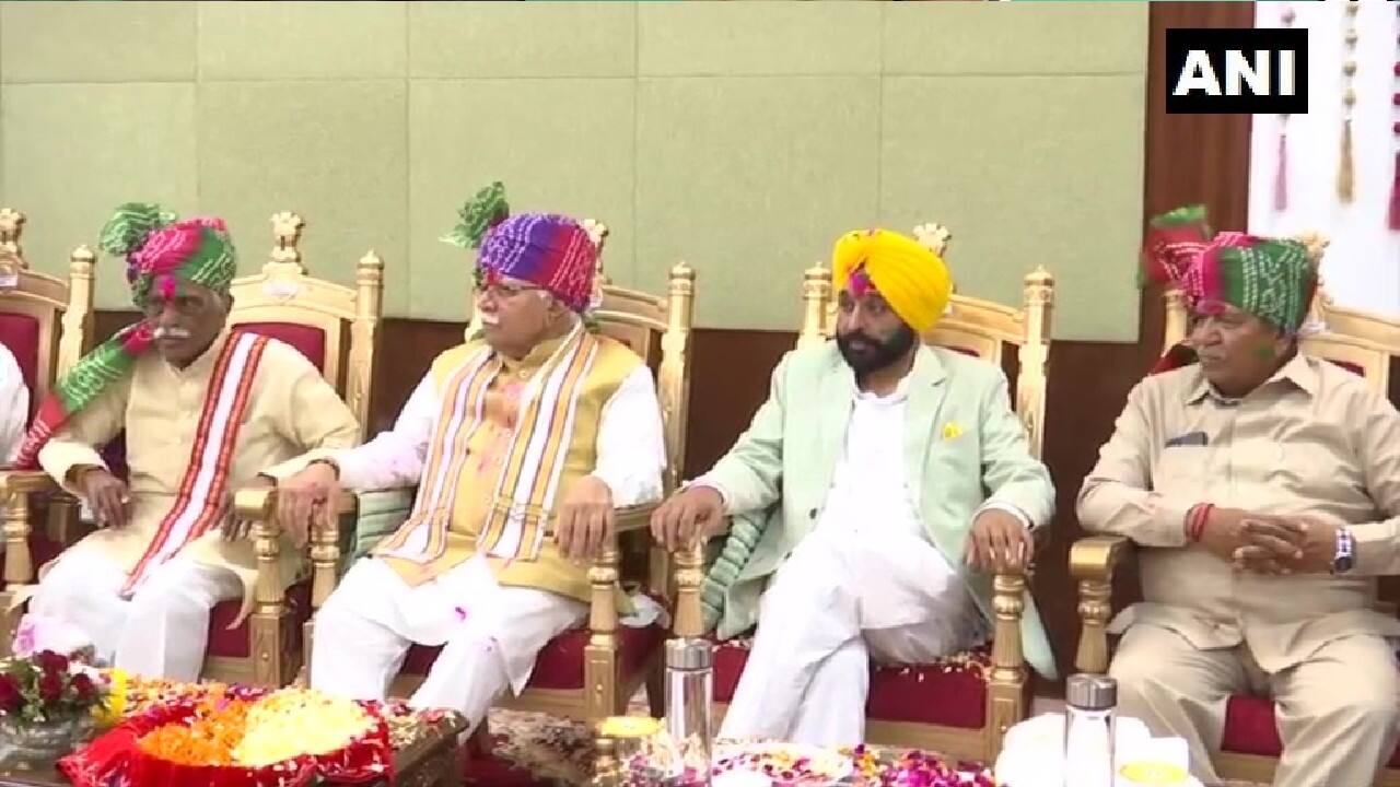 Punjab's newly elected CM Bhagwant Mann participated in 'Holi Milan Samaroh' at Haryana Raj Bhawan in Chandigarh on March 17. Haryana Governor Bandaru Dattatreya and CM Manohar Lal Khattar were also present during the event. (Image: Twitter @ANI)
