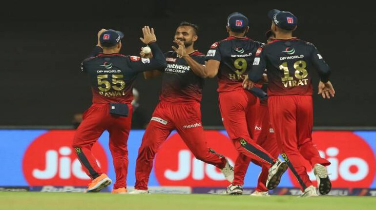 RCB bowlers smother KKR to win first match of the season