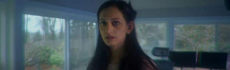 The four female protagonists of 'Caged' reach to each other.