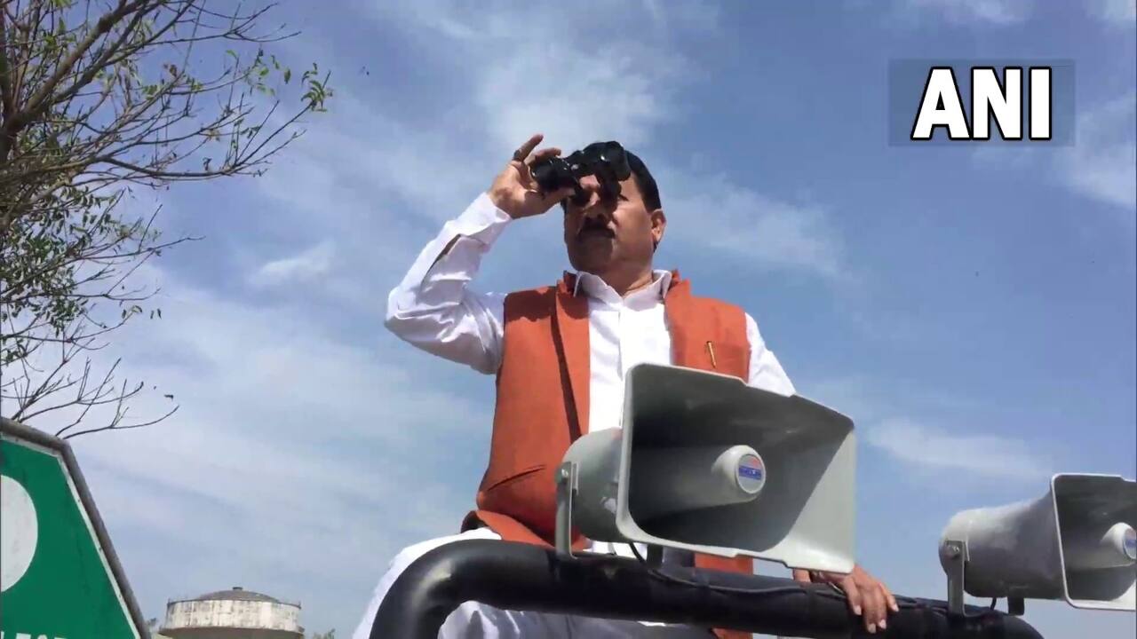 Samajwadi leader is guarding EVMs with binoculars ahead of UP counting day | Watch Samajwadi leader is guarding EVMs with binoculars ahead of UP counting day | Watch