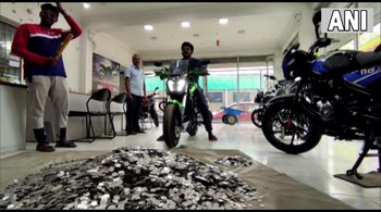 It took the store manager and his colleagues 10 hours to count all the coins. (Image credit : ANI)