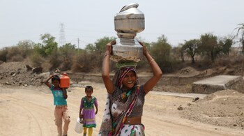 Across the length and breadth of India, women and girls wage a daily battle for water—one collateral victim of this battle is lower attendance for girls in school. (Image: Gyan Shahane via Unsplash)
