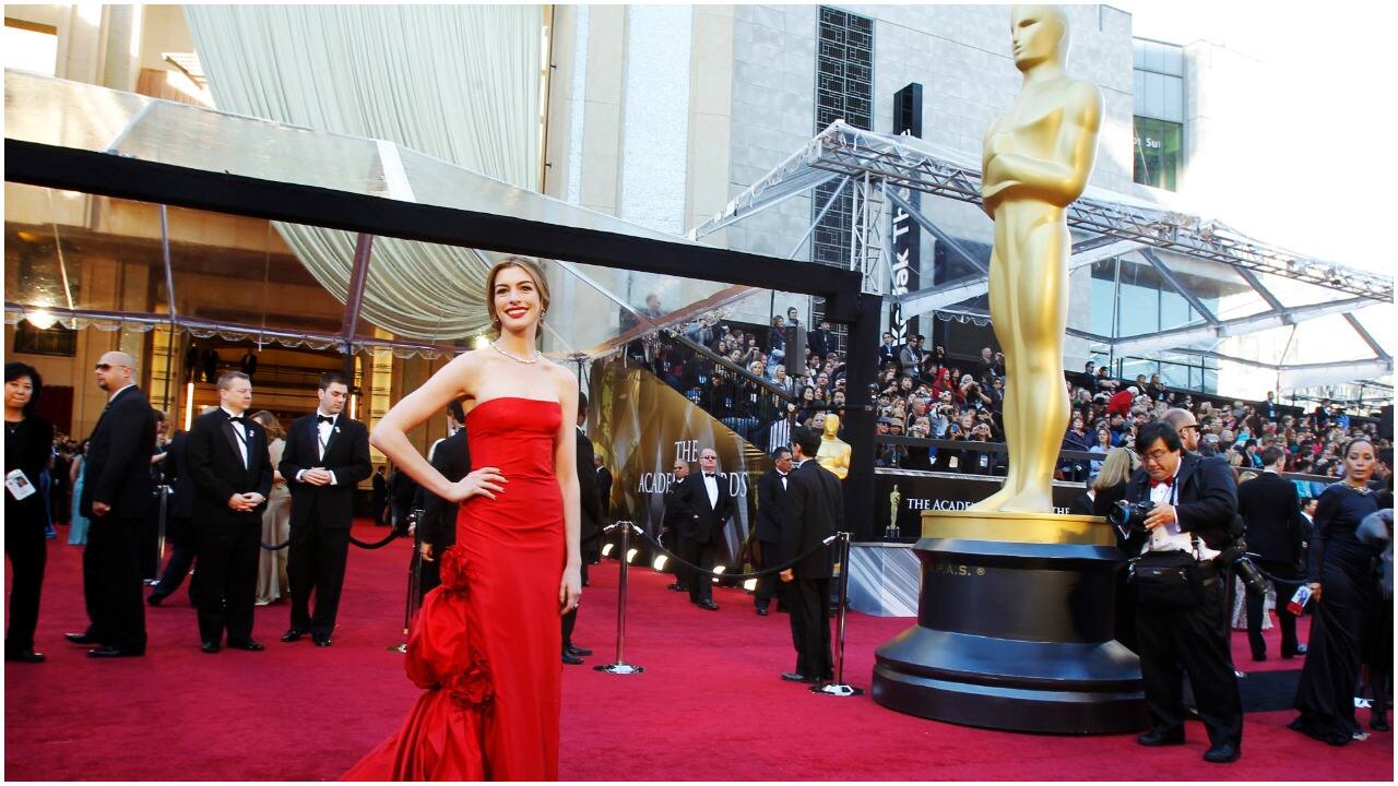 Anne Hathaway wore this red Valentino gown worth $80,000 in 2011. She completed her look with a Tiffany &amp; Co necklace, which reportedly cost $10 million. (Image credit: Reuters)