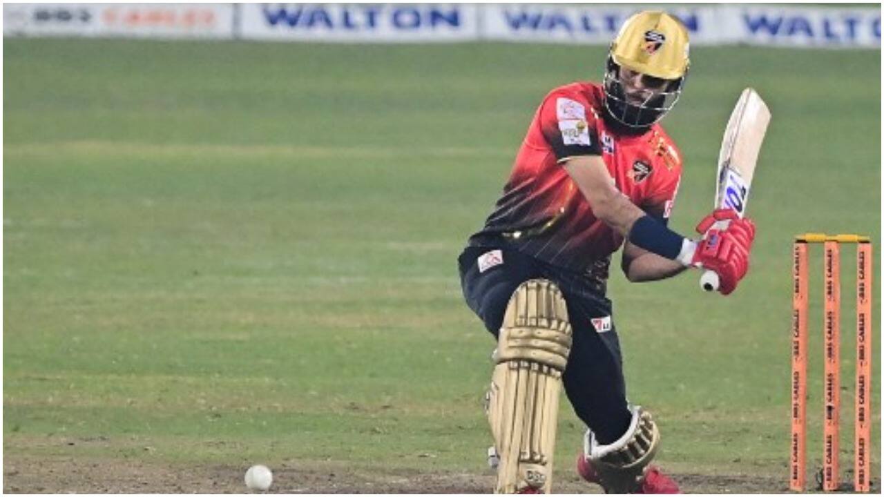 Comilla Victorian's Moeen Ali plays a shot during the Bangladesh Premier League (BPL) second qualifier Twenty20 cricket match between Chattogram Challengers and Comilla Victorian at the Sher-e-Bangla cricket stadium in Dhaka on February 16, 2022.