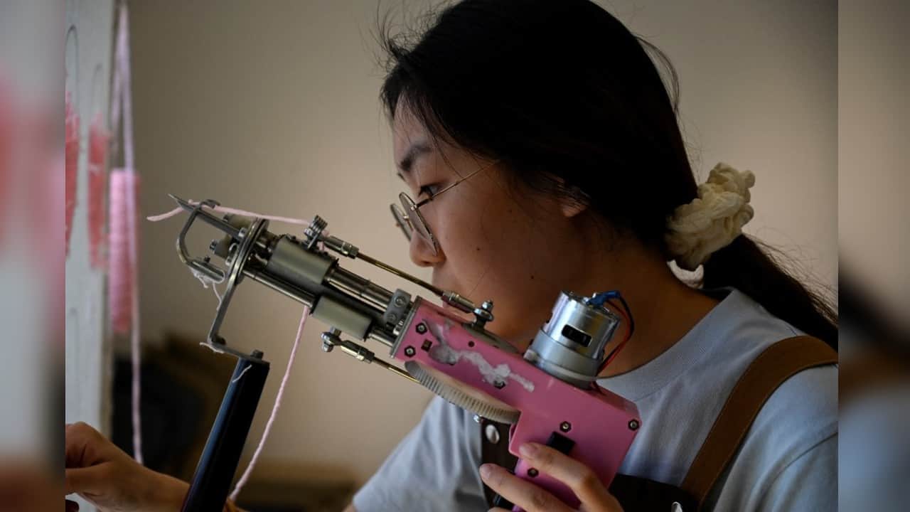 The hobby is riding a wave of popularity as it draws in young people hunting entertainment away from work, said Xu. "We know that (the development of) tufting will likely go through a bottleneck period, and the market will not grow anymore after it reaches a certain scale," he admitted. "But it's still on a rising trend." (Source: AFP) The hobby is riding a wave of popularity as it draws in young people hunting entertainment away from work, said Xu. "We know that (the development of) tufting will likely go through a bottleneck period, and the market will not grow anymore after it reaches a certain scale," he admitted. "But it's still on a rising trend." (Source: AFP)