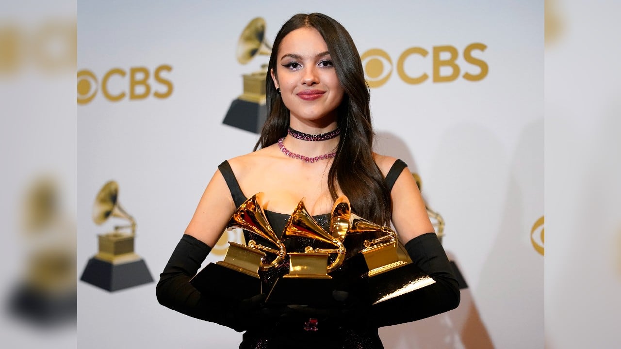 Olivia Rodrigo, winner of the awards for best pop vocal album for &quot;Sour,&quot; best new artist and best pop solo performance for &quot;drivers license,&quot; poses in the press room at the 64th Annual Grammy Awards at the MGM Grand Garden Arena on April 3. (Image: AP)