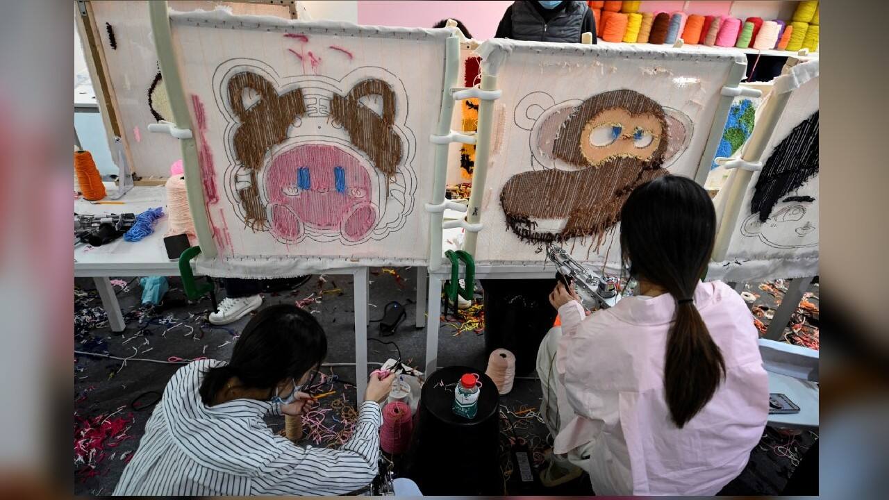 On a recent Saturday around twenty young people, mostly women, packed out the brightly-lit studio, each holding a tufting gun in their hands. "It requires a lot of patience, but as long as you get the hang of it, tufting is not difficult," first-time tufter and state company employee Yan Xinyue told AFP. (Source: AFP) On a recent Saturday around twenty young people, mostly women, packed out the brightly-lit studio, each holding a tufting gun in their hands. "It requires a lot of patience, but as long as you get the hang of it, tufting is not difficult," first-time tufter and state company employee Yan Xinyue told AFP. (Source: AFP)