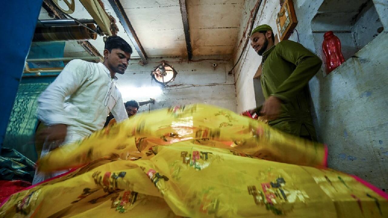Demand for Banarasi saris, already limited to a select Indian clientele able to justify spending at a premium, has also suffered in the wake of the Covid-19 pandemic. The virus threat may have receded in India, but job losses and a big dent to the economy have taken their toll. (Image: AFP)