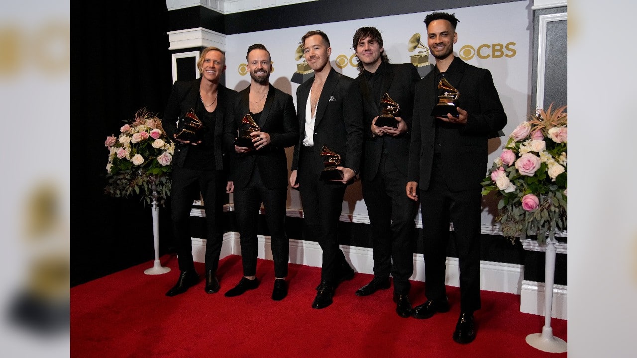 Tyrone Lindqvist, from left, Jon George, and James Hunt of Rufus Du Sol, Jason Evigan and Cassian Stewart-Kasimba, winners of Best Dance/Electronic Recording for &quot;Alive,&quot; at the 64th Annual Grammy Awards. (Image: AP)