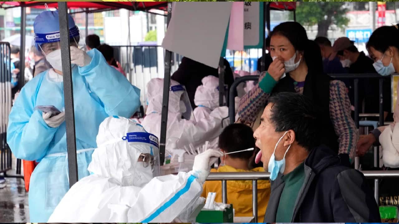 No such lockdown has yet been announced for Guangzhou, a metropolis of 18 million northwest of Hong Kong that is home to many top companies and China's busiest airport. Just 27 cases were reported in the city on April 11. However, primary and middle schools have been switched to online after an initial 23 local infections were detected last week. An exhibition center was being converted into a makeshift hospital after authorities said earlier they would begin citywide mass testing. Only citizens with a “definite need&quot; to leave Guangzhou can do so, and only if they test negative for the virus within 48 hours of departure, city spokesperson Chen Bin said in a social media announcement. (Image: AP)