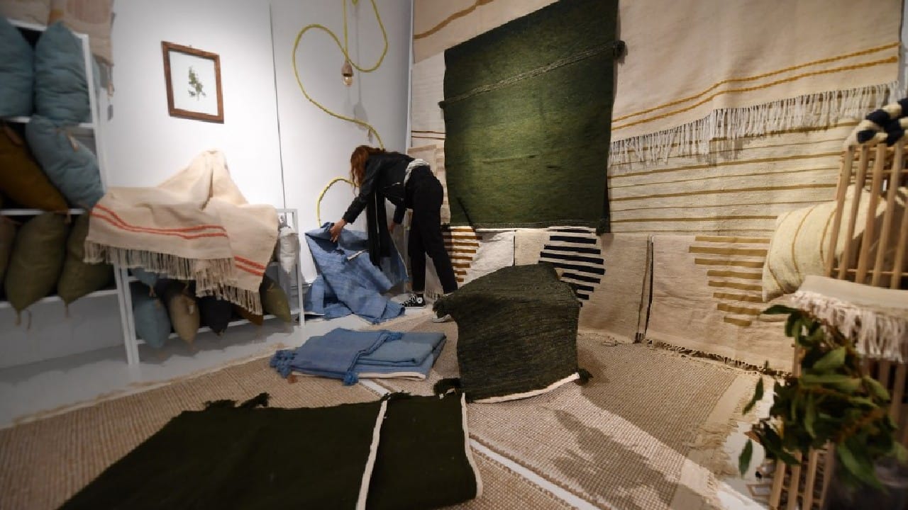 Najet says she is happy to be making a living from home. "I don't have to go out for anything, I can cook and eat here, I can work comfortably." (Image: AFP)